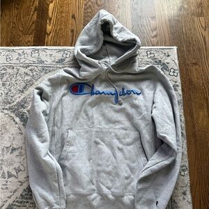 Champion Light Gray Hoodie with Blue Logo